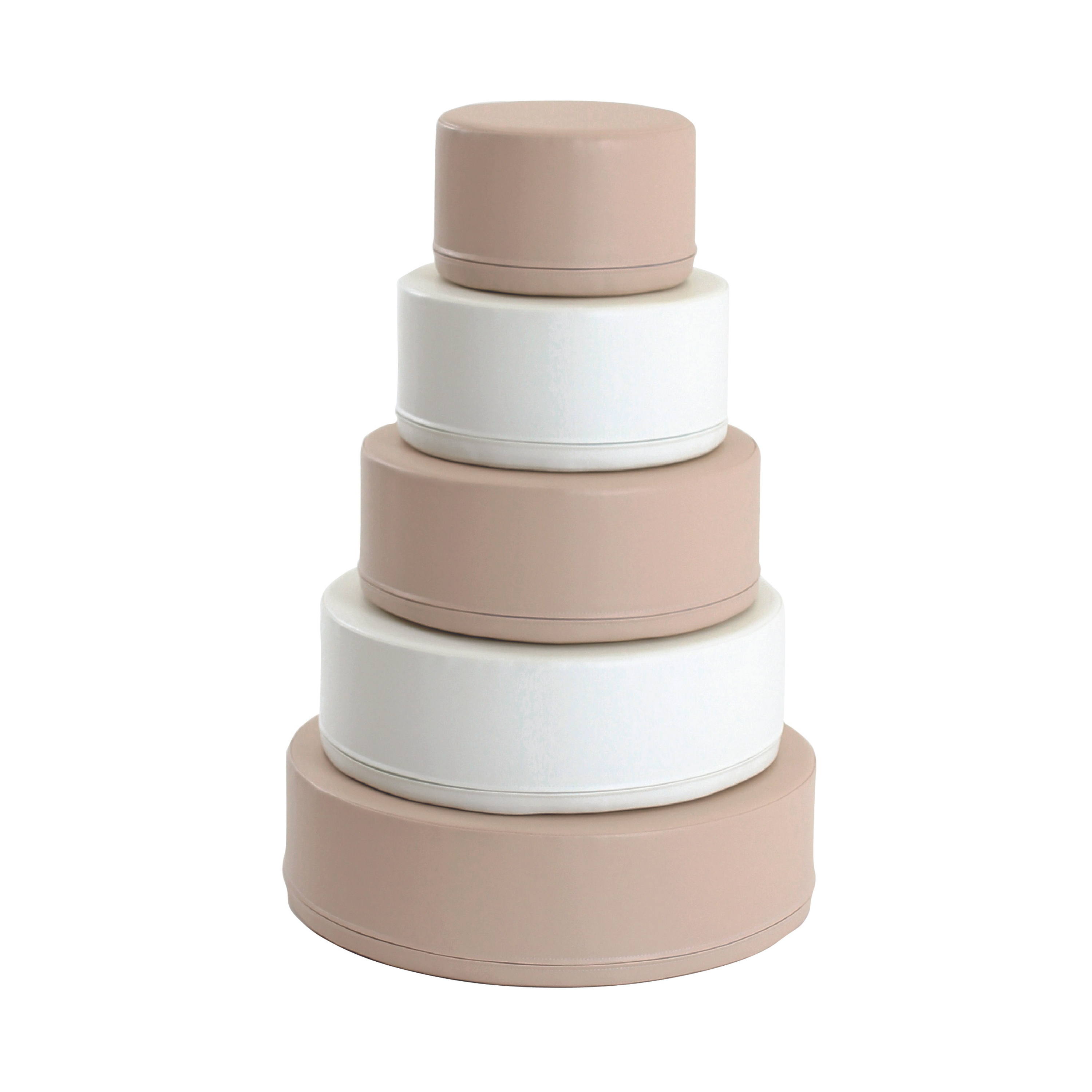 A stack of beige and white round soft blocks