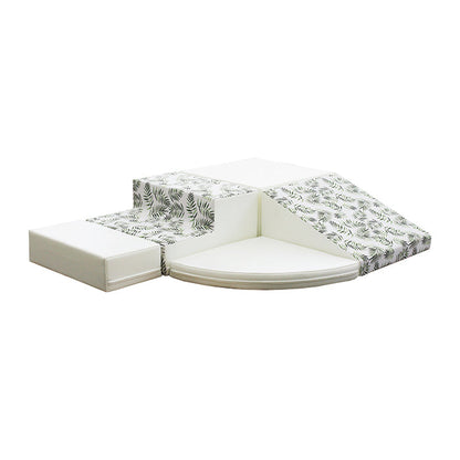 A white box with a flower pattern on it, designed to enhance balance and gross motor skills, part of the IGLU Soft Play Soft Play Foam Block Set - Corner Climber.