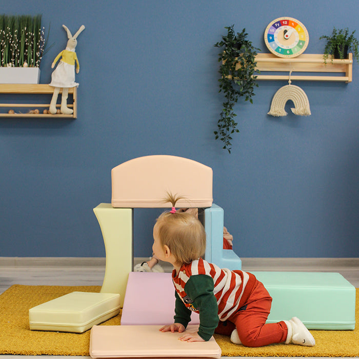 A child is playing with a IGLU Soft Play - Soft Play Set - Little Crawler.