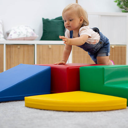 A toddler crawling and discovering the IGLU Soft Play - Two Way Crawler in a room.
